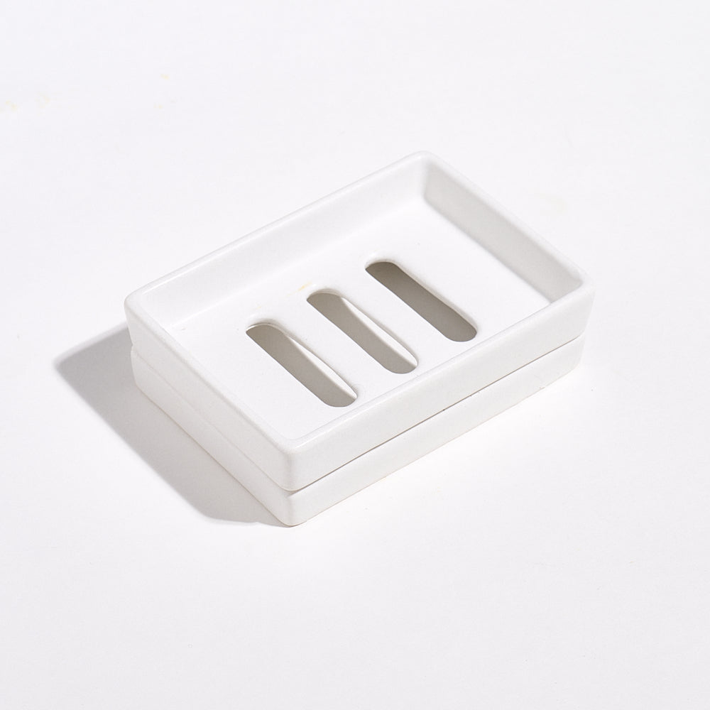 Jesmonite White marble soap dish with tray on a light gray background