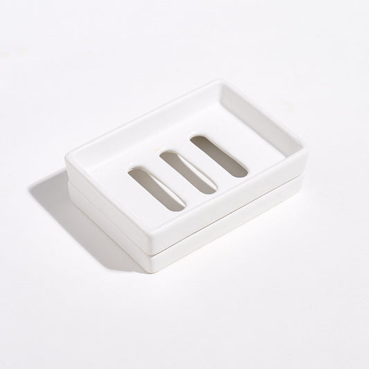 Jesmonite White marble soap dish with tray on a light gray background